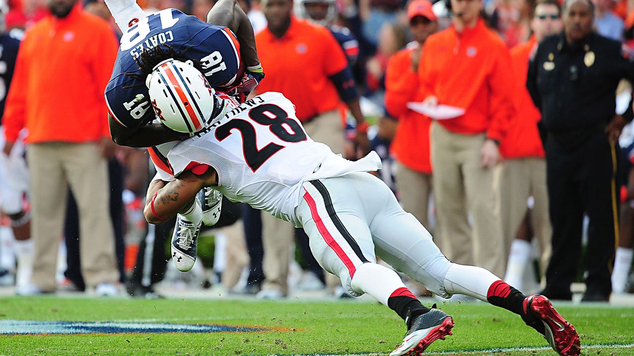 Four Georgia players arrested, charged with illegal check-cashing